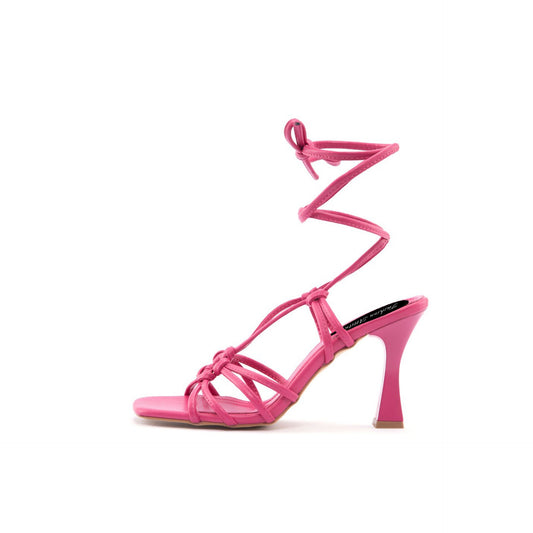 Vibrant pink strappy Fashion Attitude sandals with a bold silhouette and sculptural heel design. Sofybrands Fashion Outlet